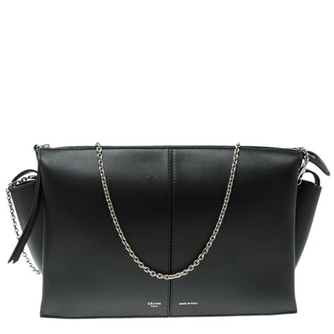 celine black leather clutch|Celine clutch with chain.